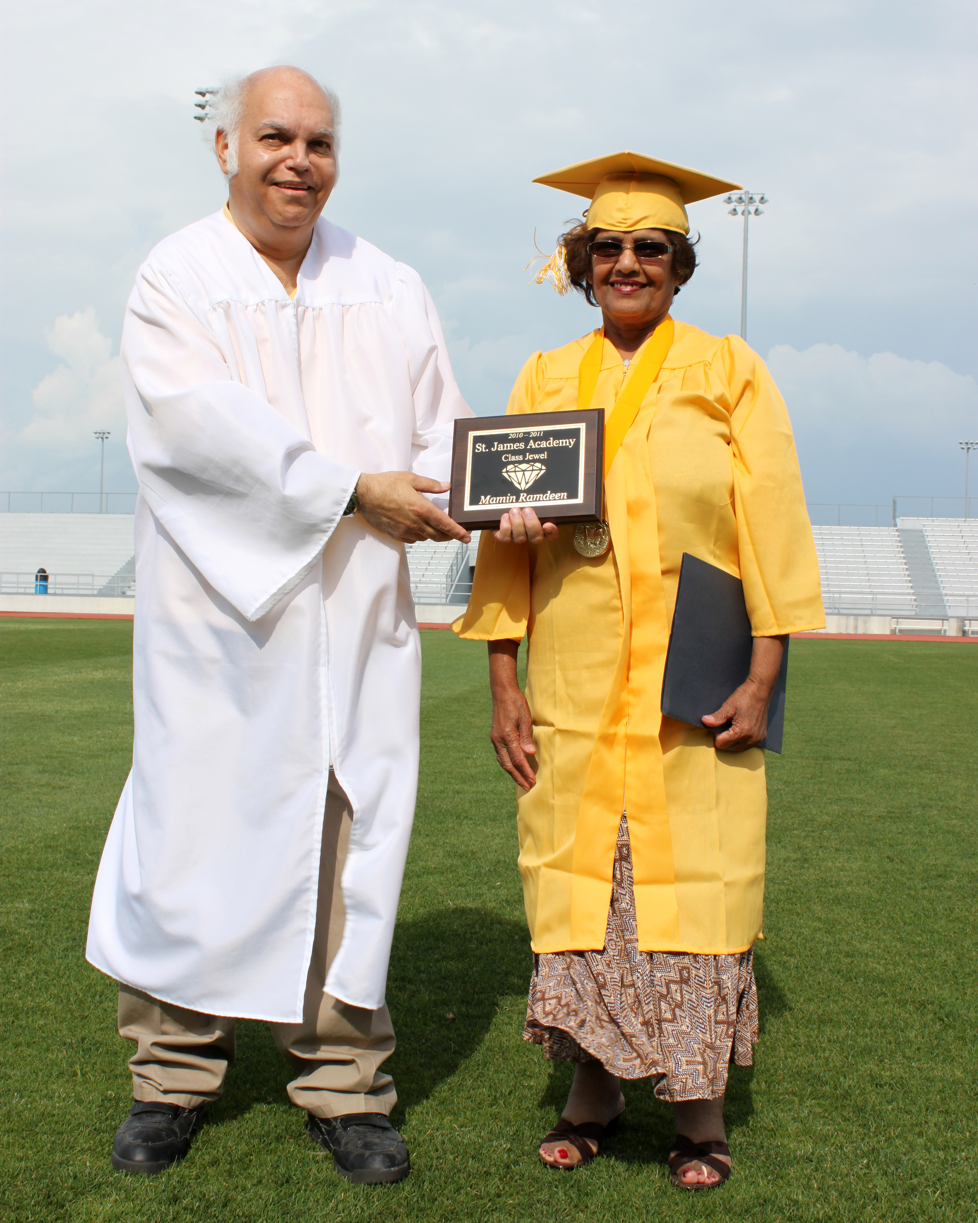 Class Jewel and Valedictorian Mamin Ramdeen with Director, Jim Mason